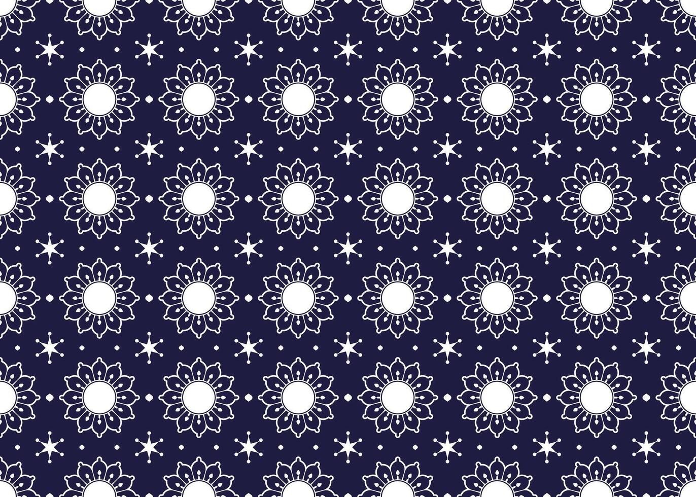 White symbol flowers form on dark blue background, ethnic fabric seamless pattern design for cloth, carpet, batik, wallpaper, wrapping etc. vector