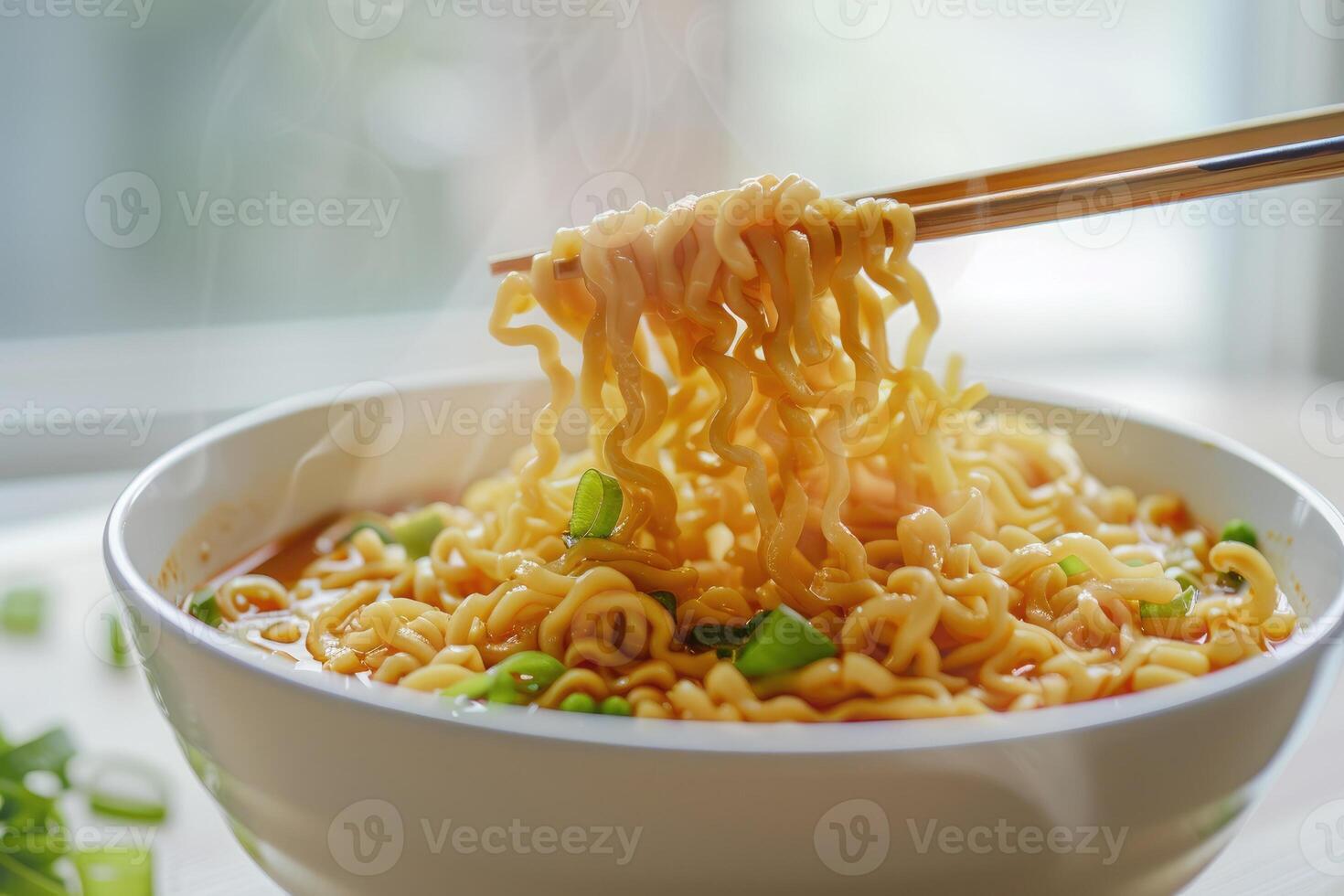 Cooked instant noodles sprinkled with spices, vegetables, herbs. photo