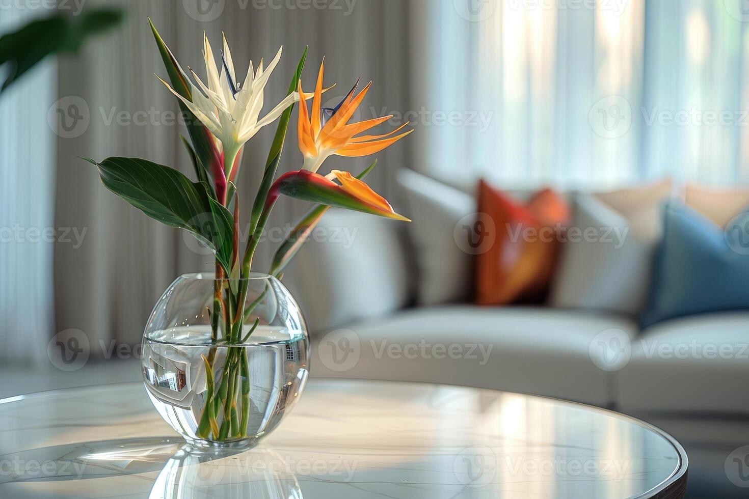 Beautiful bird of paradise flower arrangement in a crystal vase photo