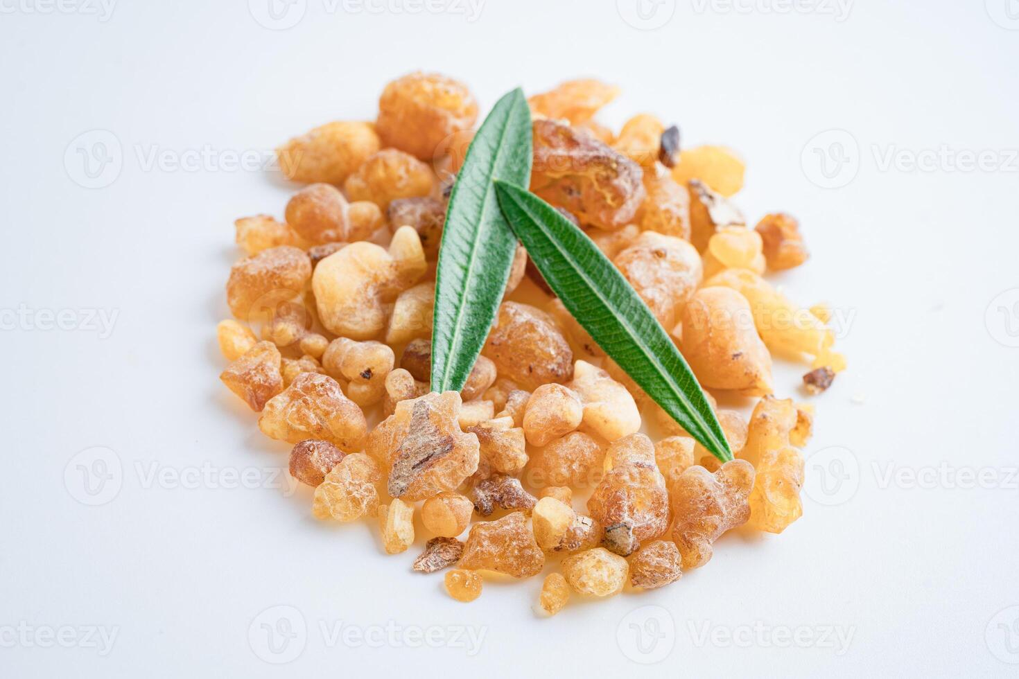 Frankincense or olibanum aromatic resin isolated on white background used in incense and perfumes. photo