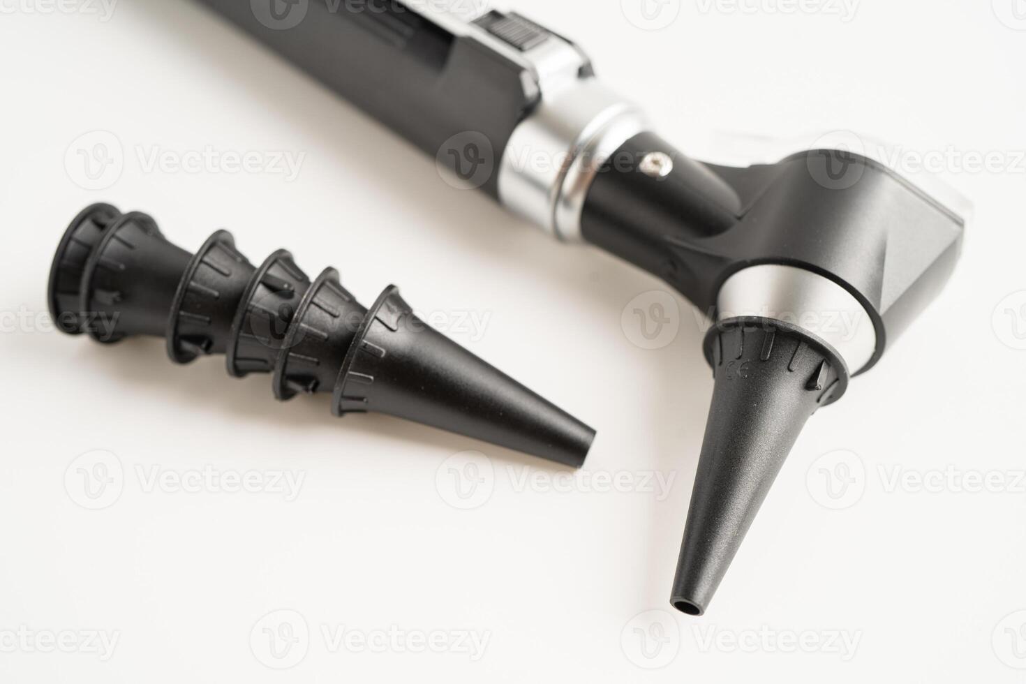 Otoscope for audiologist or ENT doctor use otoscope checking ear and treate hearing loss problem. photo