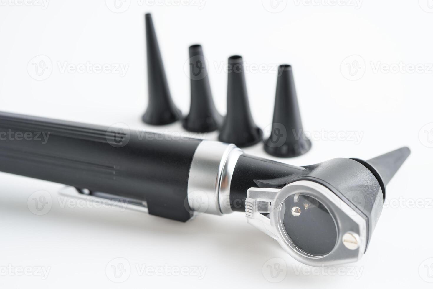 Otoscope for audiologist or ENT doctor use otoscope checking ear and treate hearing loss problem. photo