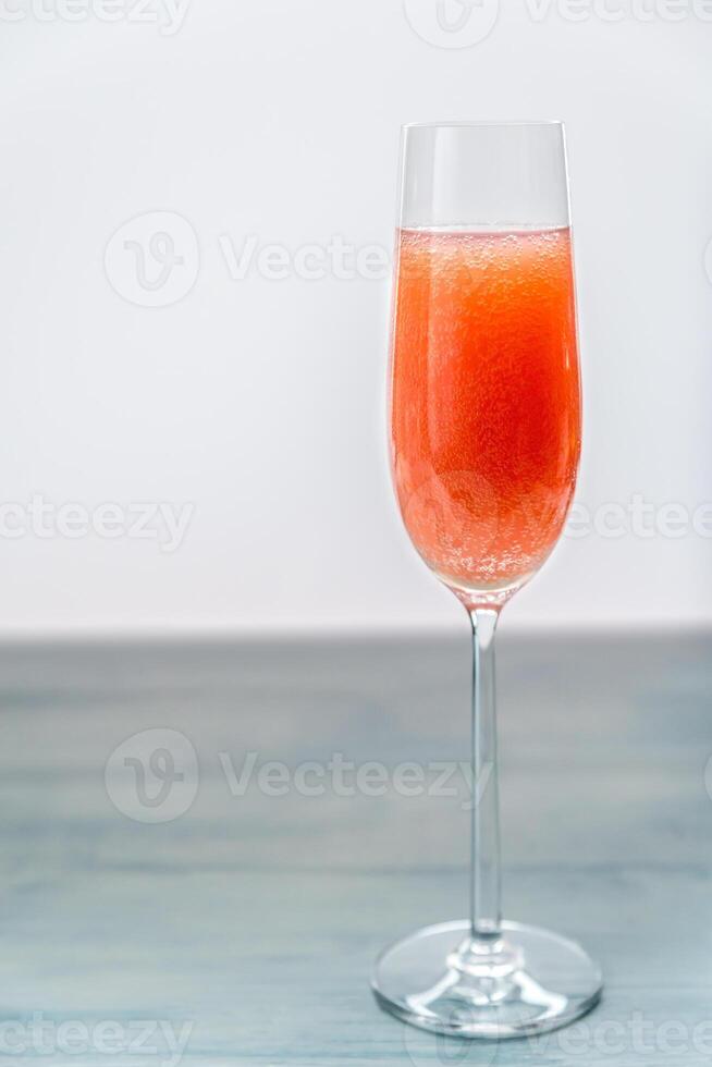 Glass of bellini cocktail photo