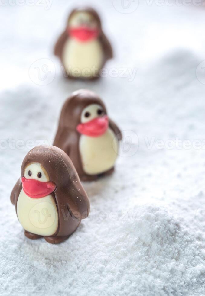 Chocolate candies in the shape of penguins photo