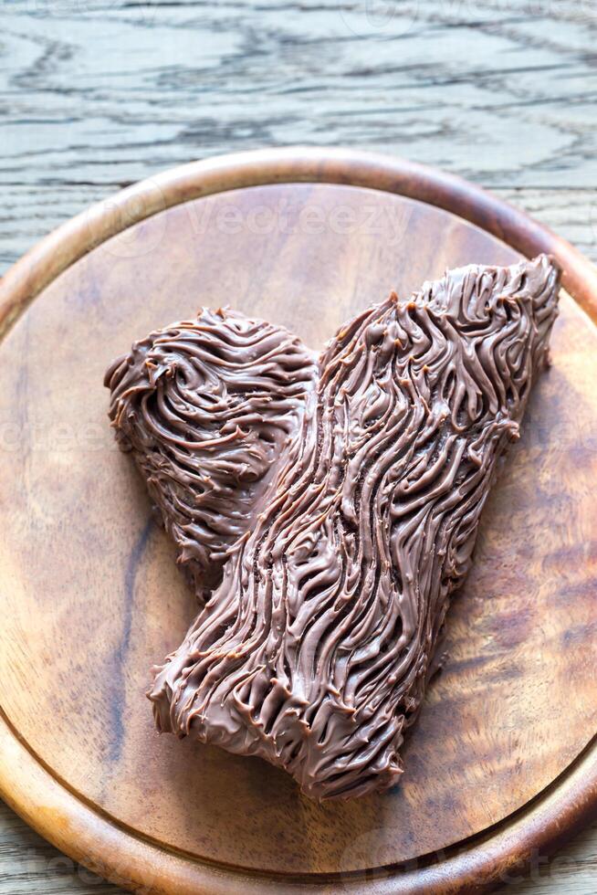 Yule log on the wooden board photo