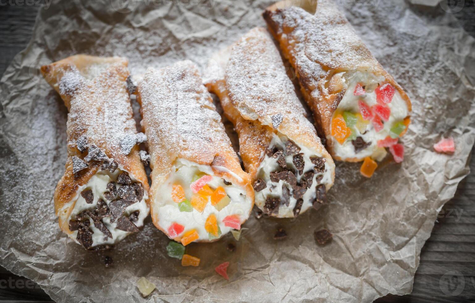 Cannoli stuffed with cream cheese photo