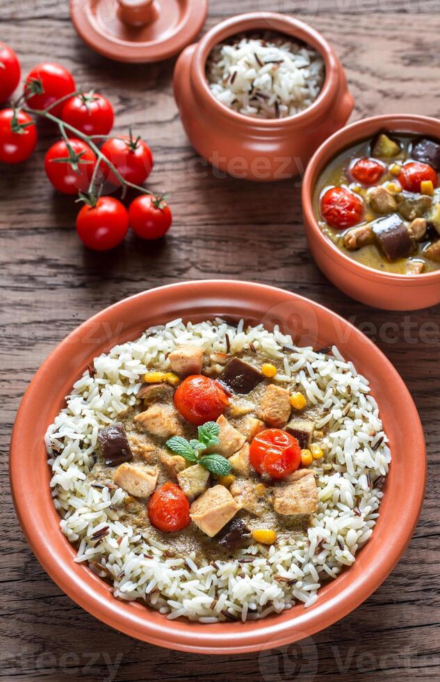 Thai green chicken curry with mix of white and wild rice photo