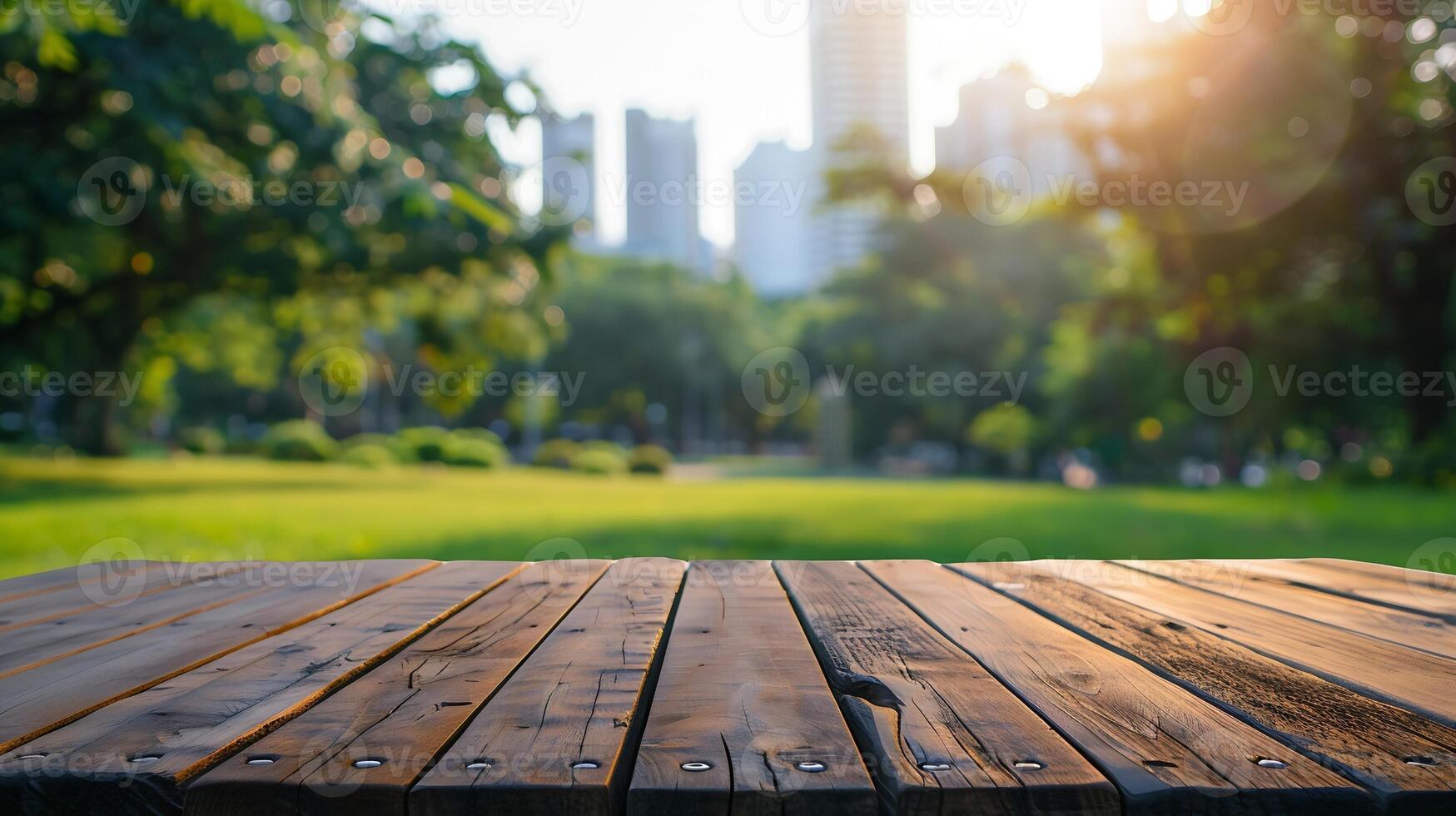 Empty wooden table with blurred city park on background, photo