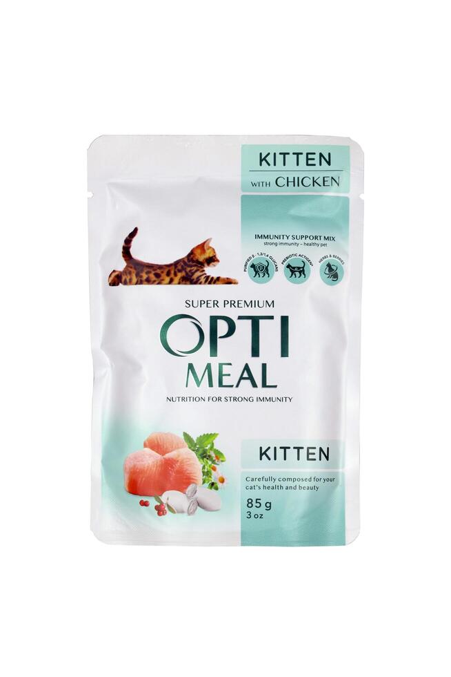 KHARKIV, UKRAINE - JANUARY 2, 2021 Optimeal cat meal packs. Optimeal is product by Kormotech LLC, a global family company, the largest producer of pet food in Ukraine photo