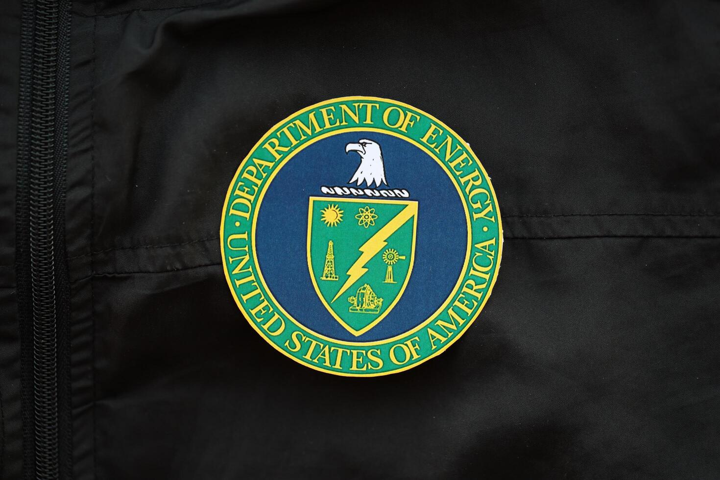 KYIV, UKRAINE - MARCH 9, 2024 US Department of Energy seal on black jacket uniform photo