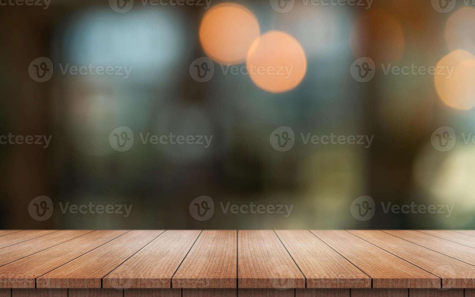 Empty wooden table top with lights bokeh on blur restaurant background. photo