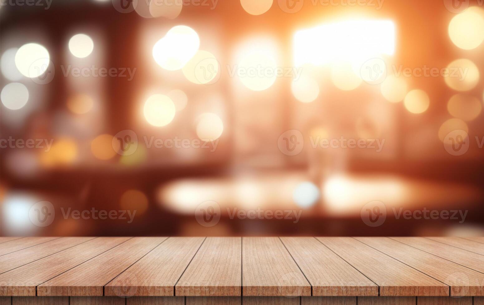 Empty wooden table top with lights bokeh on blur restaurant background. photo