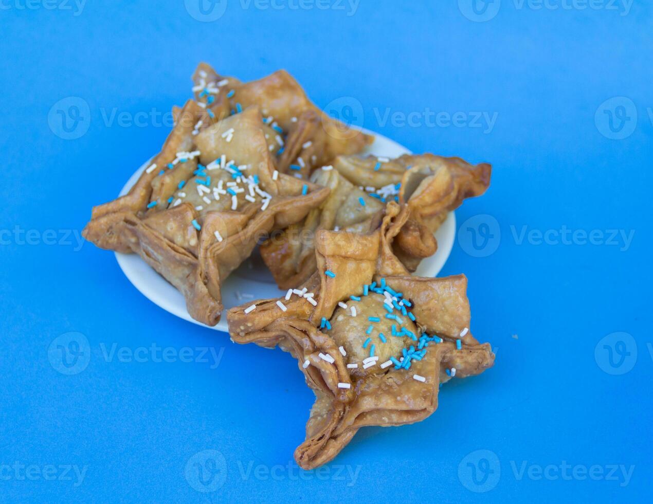 Fried pastry with quince and batata typical of argentina gastronomy photo