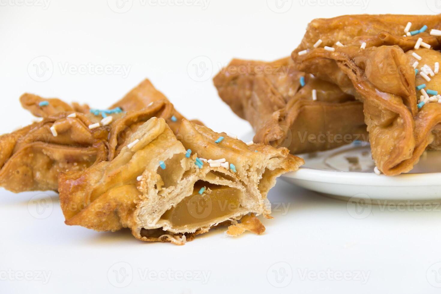 Fried pastry with quince and batata typical of argentina gastronomy photo