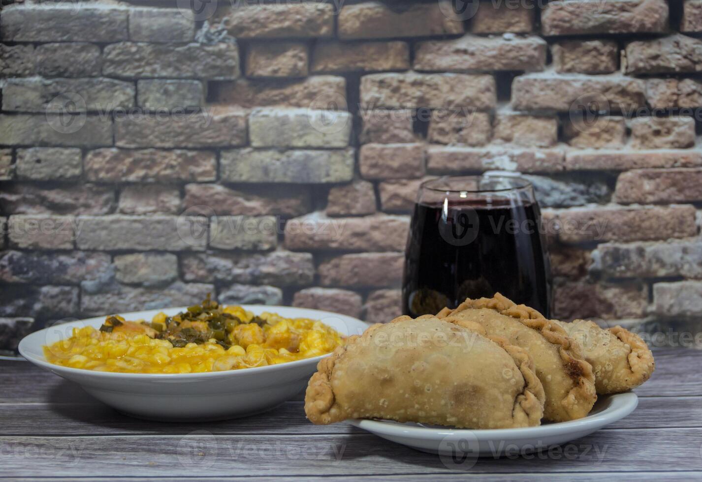 Empanadas, locro and red wine, typical Argentine food to celebrate national days photo