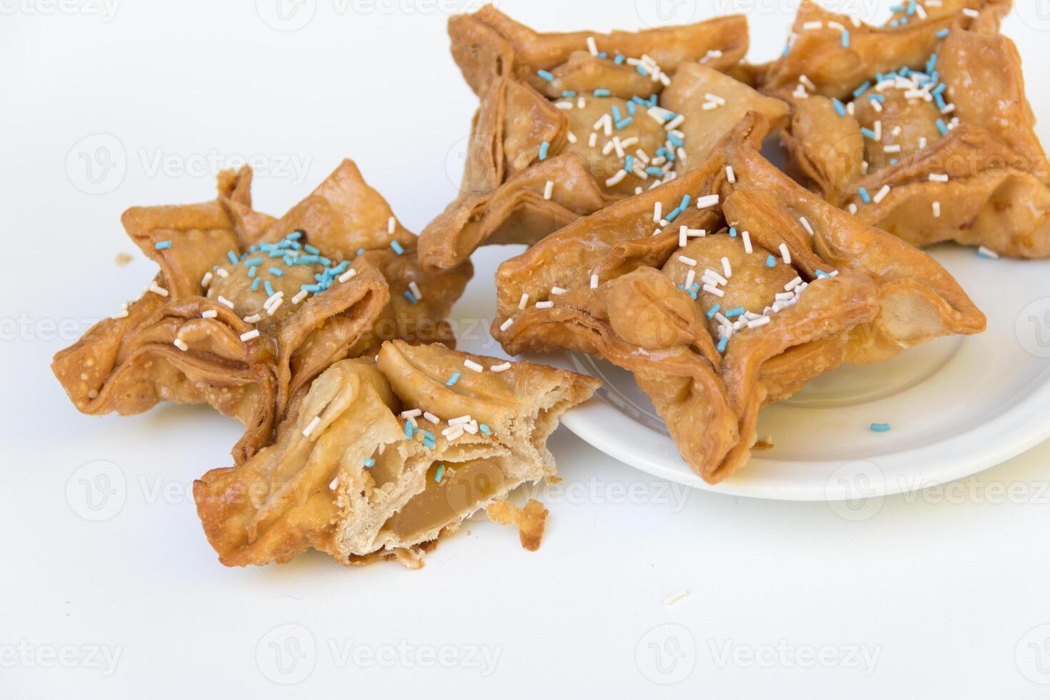 Fried pastry with quince and batata typical of argentina gastronomy photo