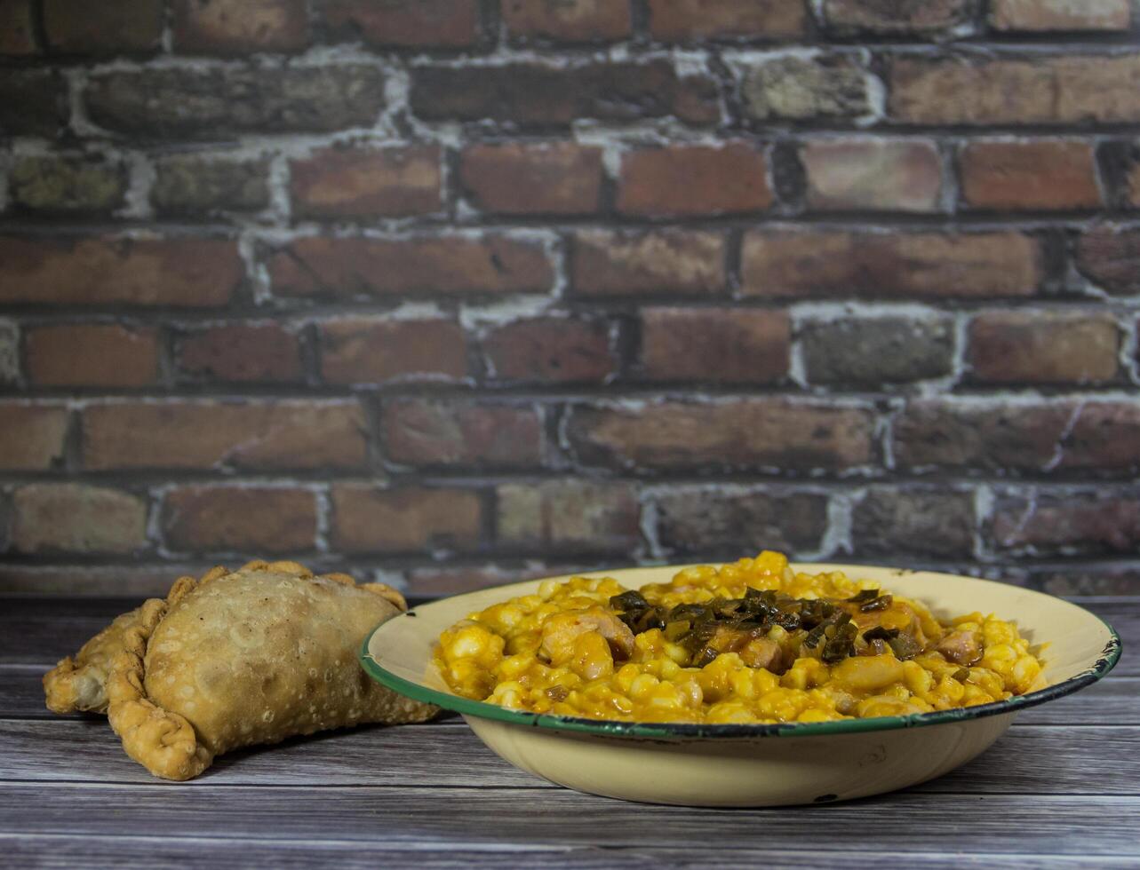 Meat empanadas and northern locro, Argentine tradition in national days photo