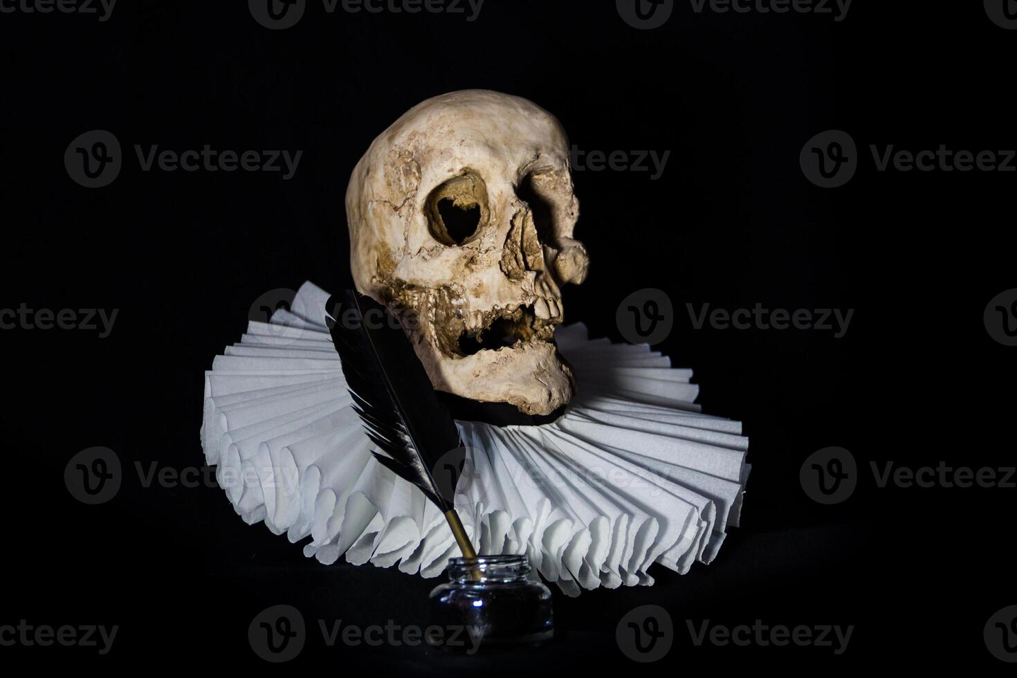 a human skull with a cervantine ruff, symbol of universal literature. photo