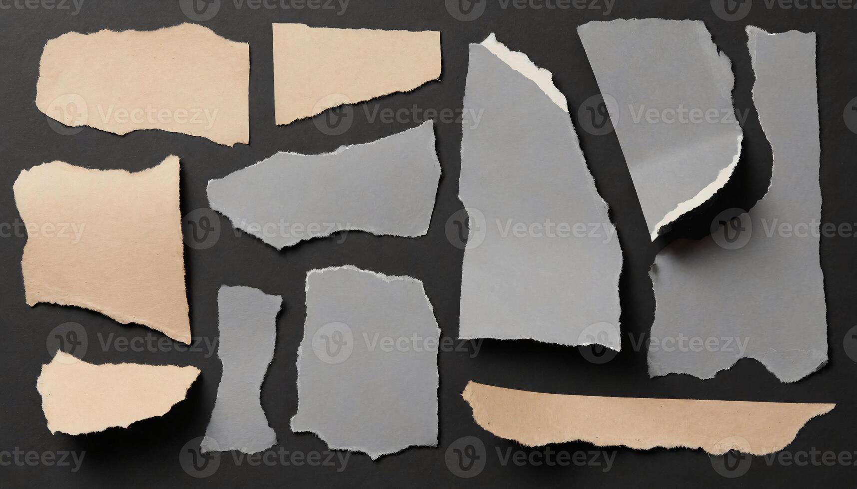 torn pieces of paper on a black background photo