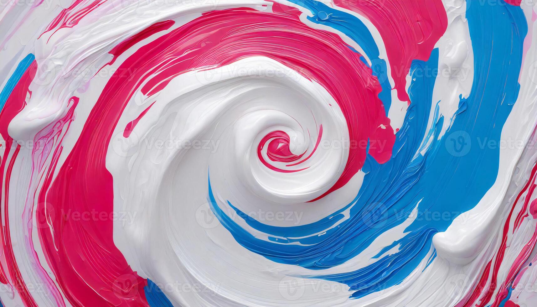 a swirl of paint with blue and pink colors photo