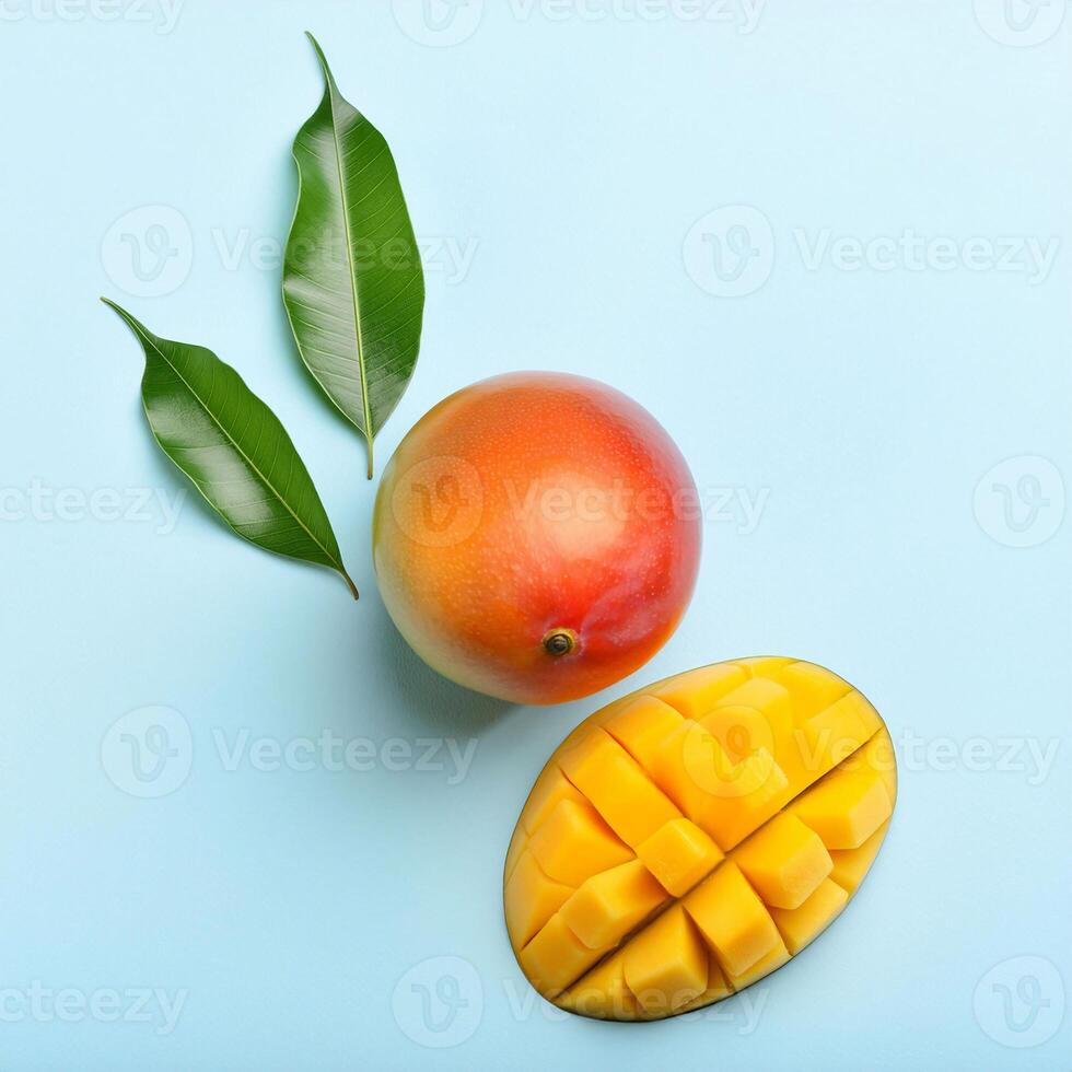 mango and mango cubes on a blue background photo