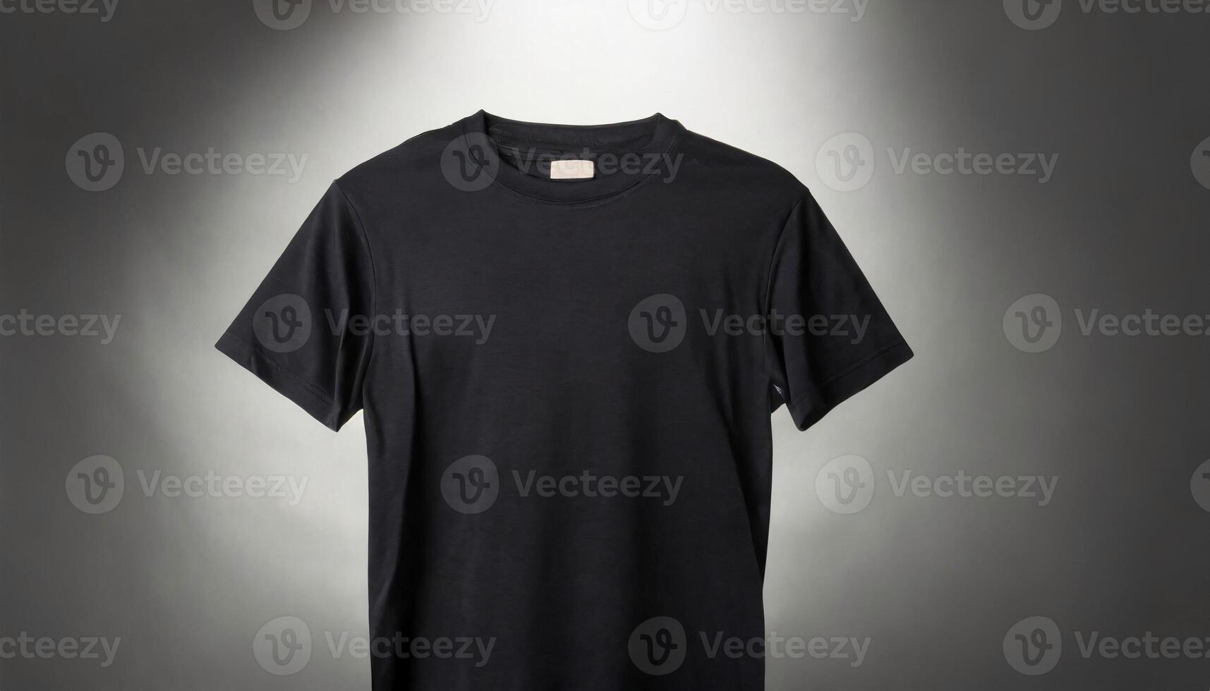 a black t - shirt on a gray background photo