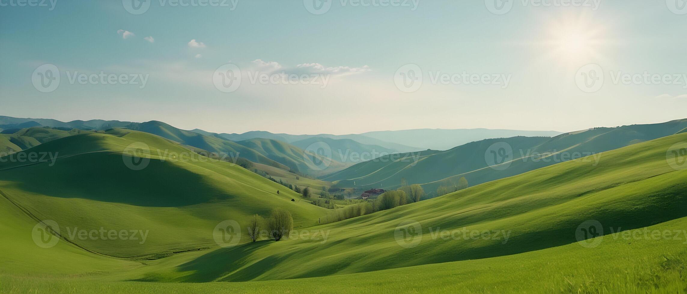 Panorama of beautiful countryside. Wonderful springtime landscape in mountains. Grassy field and rolling hills. Rural scenery photo