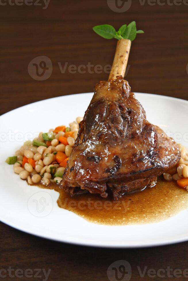 leg of lamb with broad beans photo