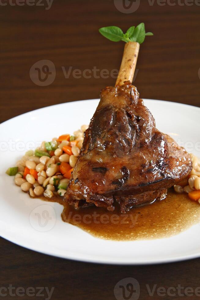 leg of lamb with broad beans photo