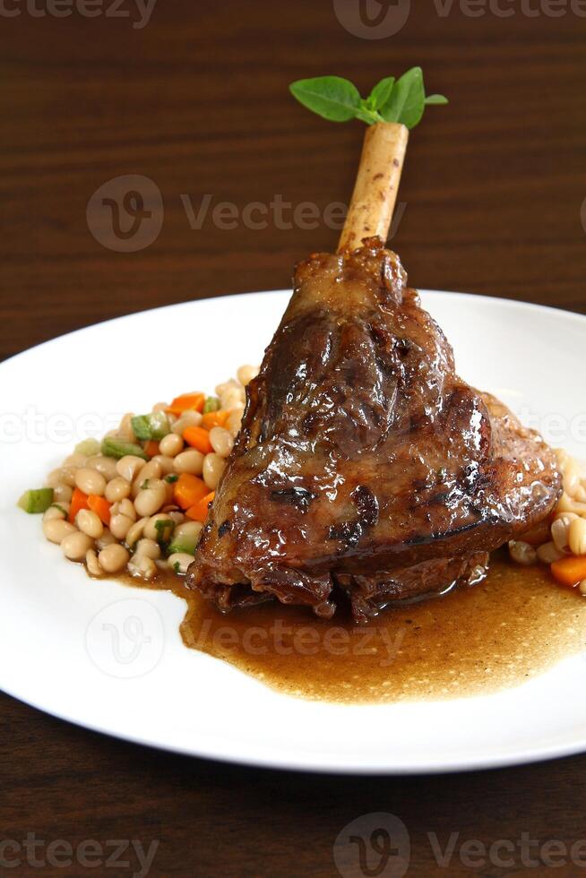 leg of lamb with broad beans photo
