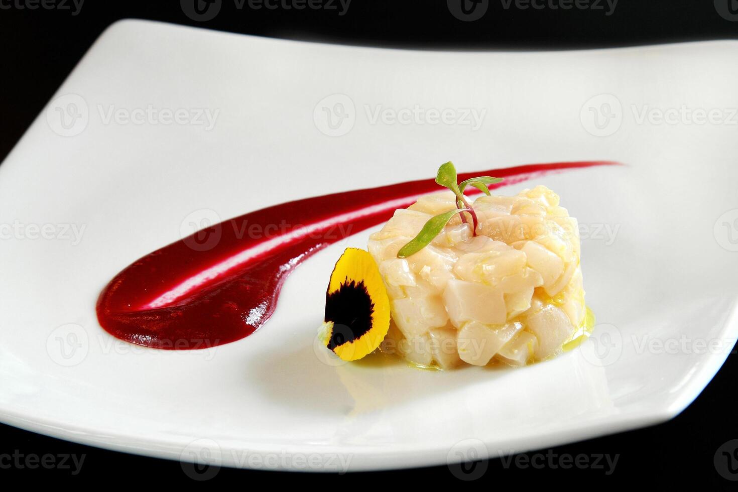 chopped scallops in olive oil sauce photo