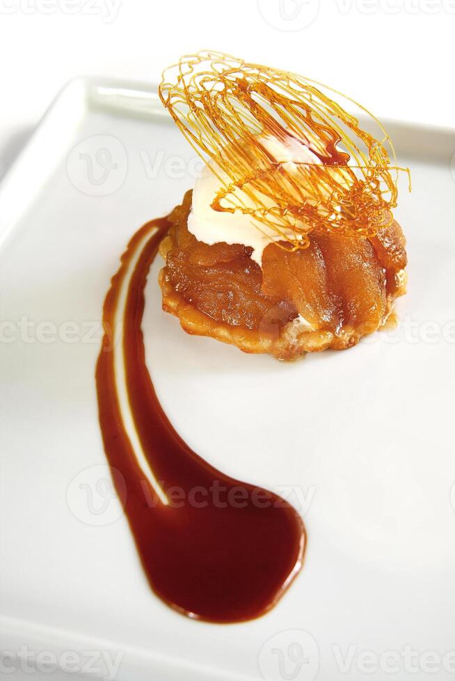 apple pie with caramel decoration photo