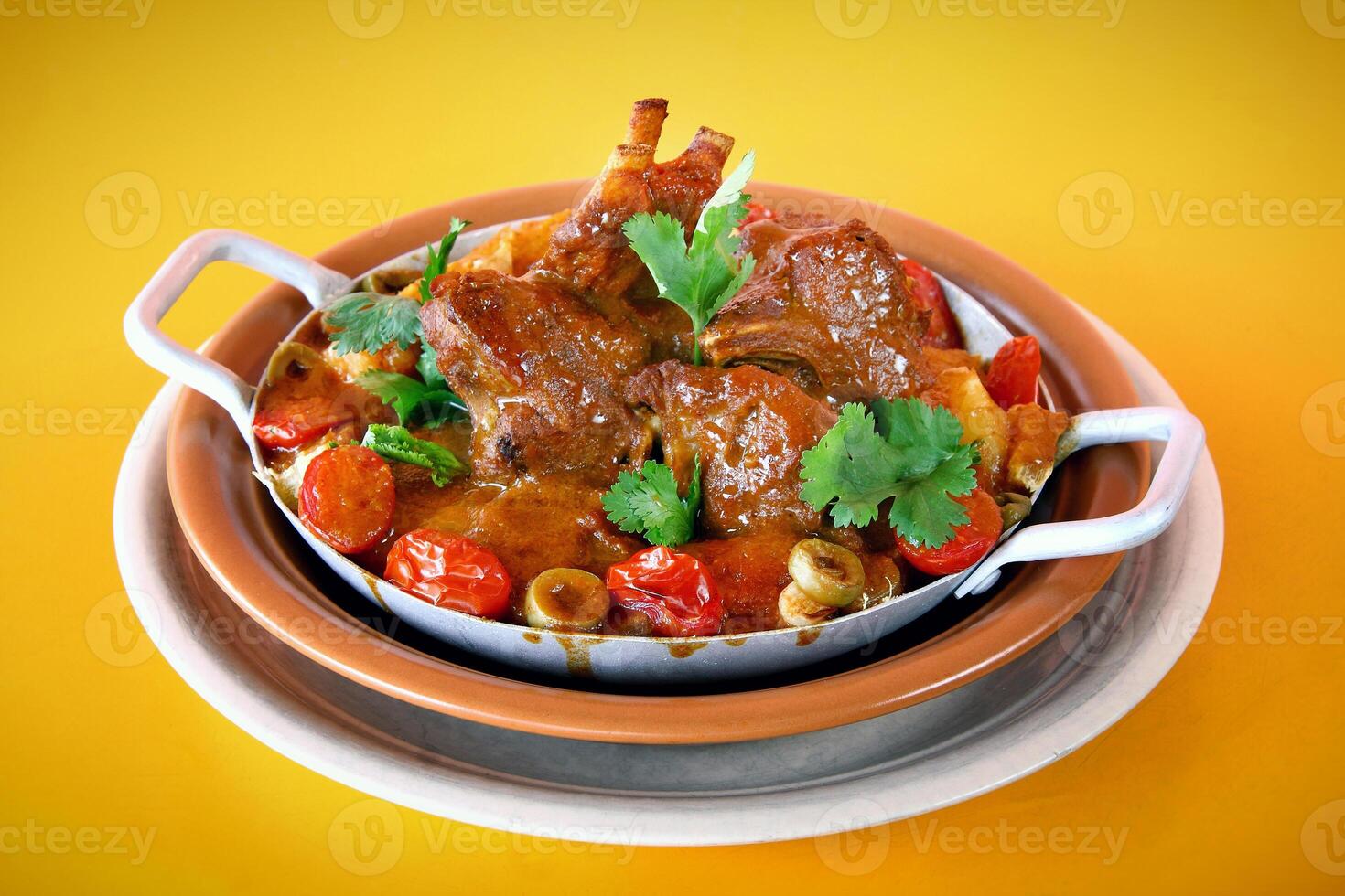 goat stew, stewed with meat and tomato sauce typical of northeastern Brazil photo