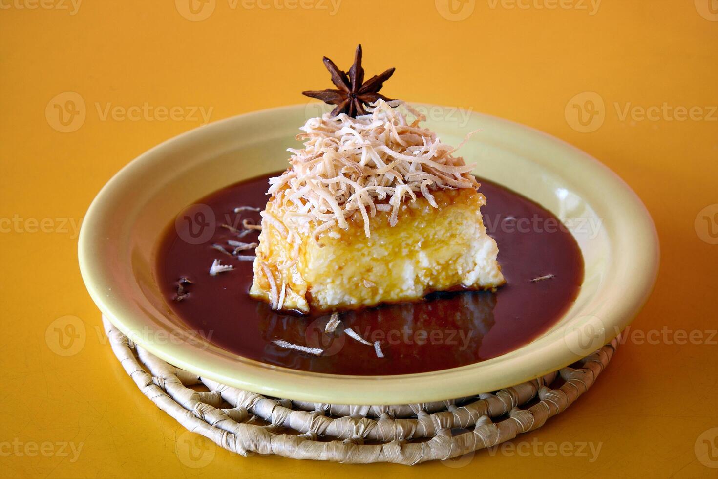 tapioca pudding with caramel sauce and grated coconut photo