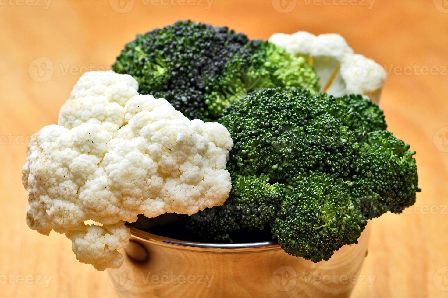 cauliflower in bowl for preparing dishes photo