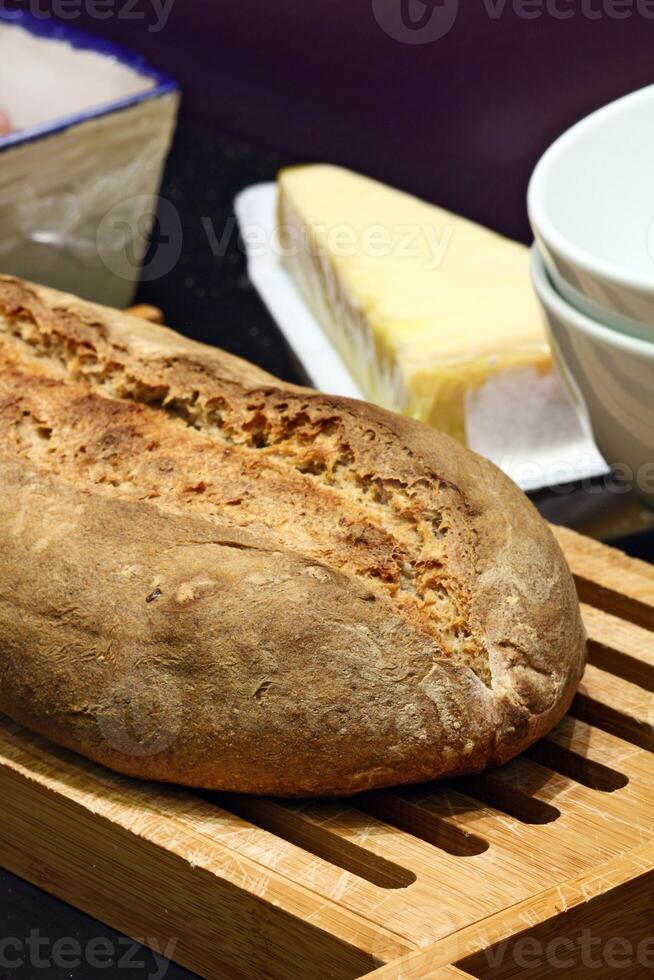 tasting home-made bread with sauces and pickles photo