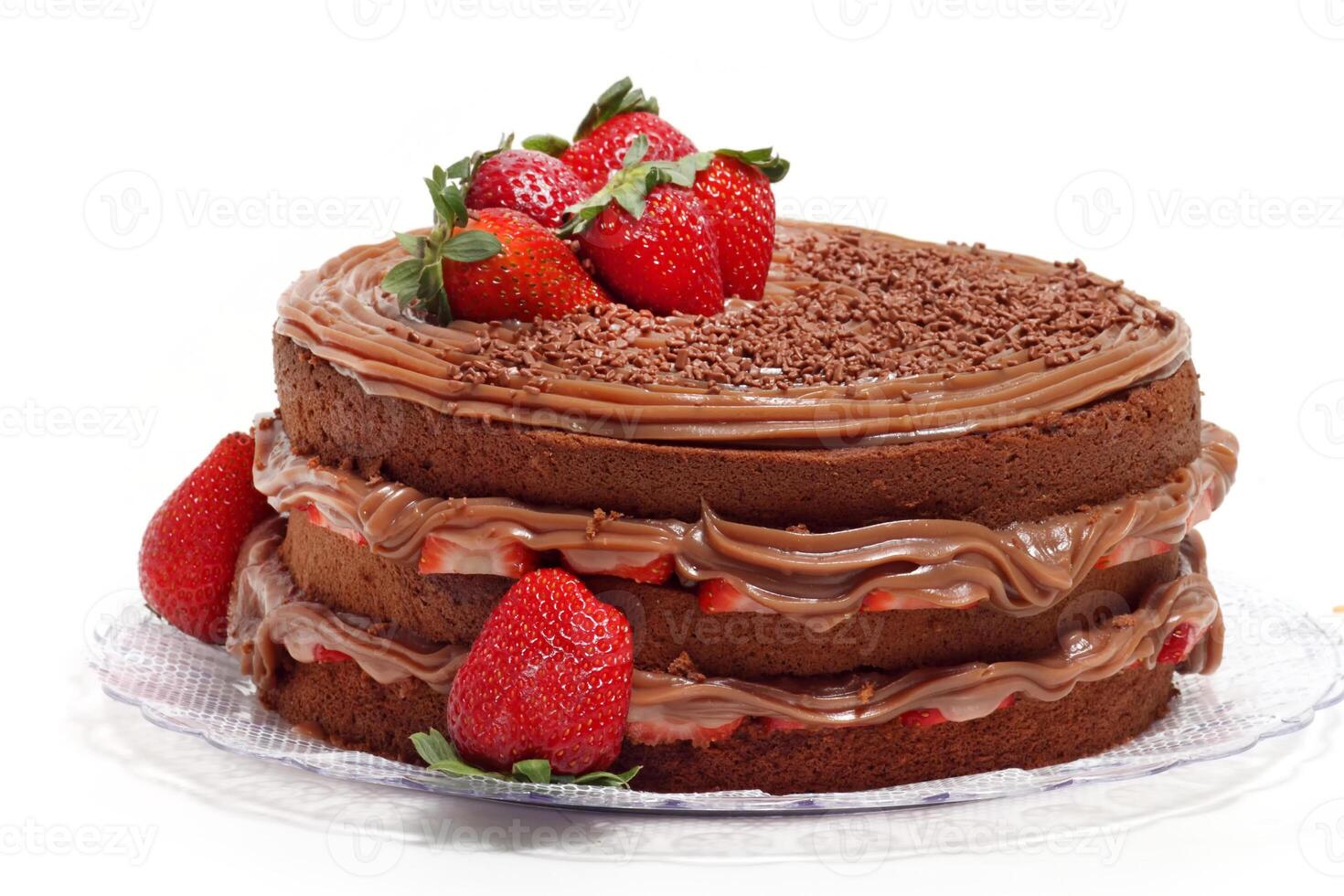 chocolate slices and cakes with cream and strawberry photo