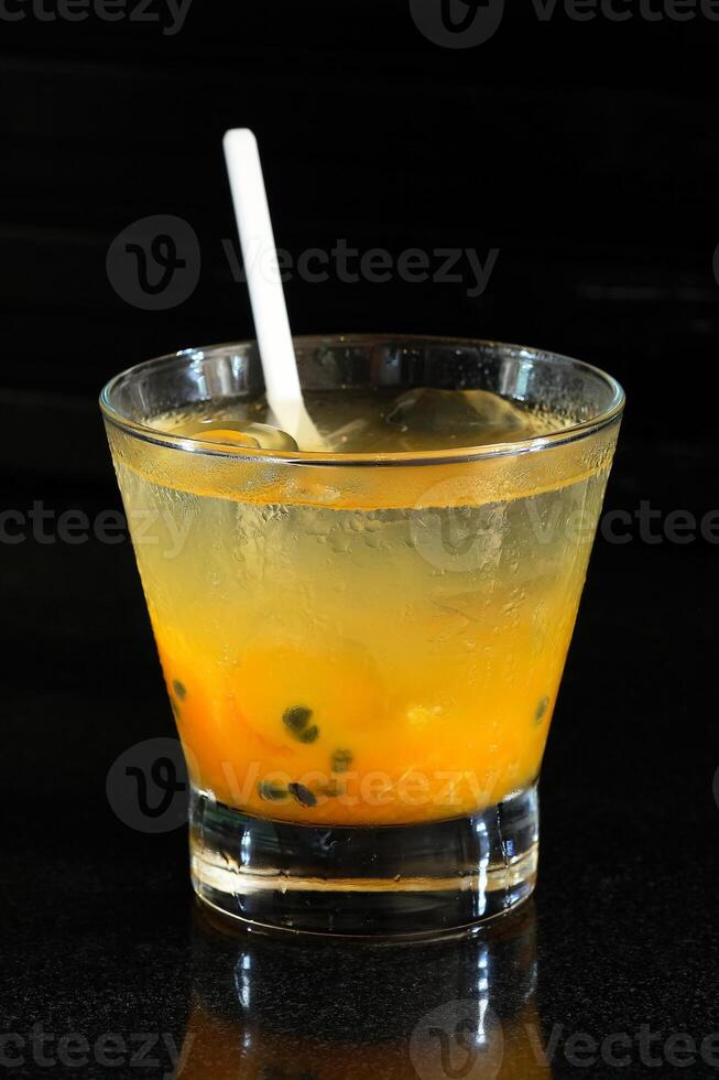 Passion Fruit Shake, drink with vodka, passion fruit juice and crushed ice photo