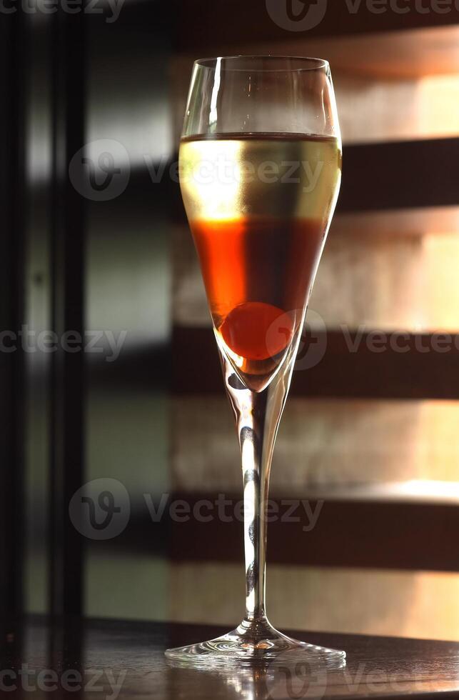 Kir Royale, drink with red fruits, cassis liqueur and brut champagne photo