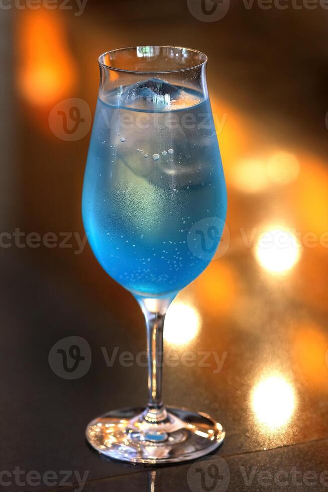 Tequila Blue, classic drink with tequila, curacau blue and lemon juice photo
