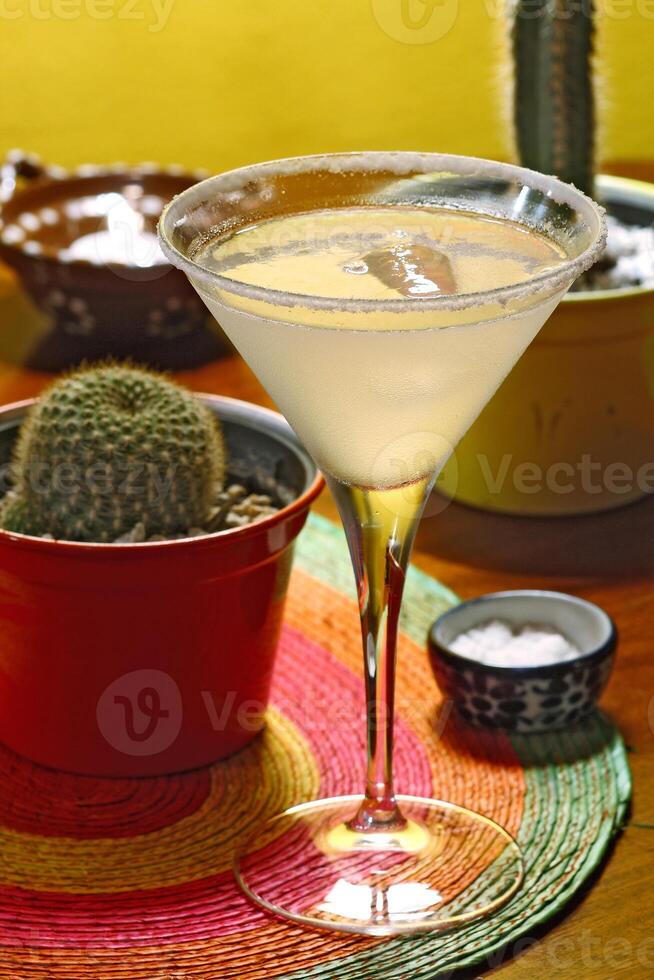 Margarita, famous drink with tequila, lime juice, liqueur and ice photo