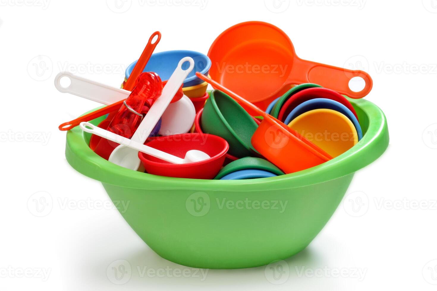 colorful kitchen utensils for children on neutral background photo