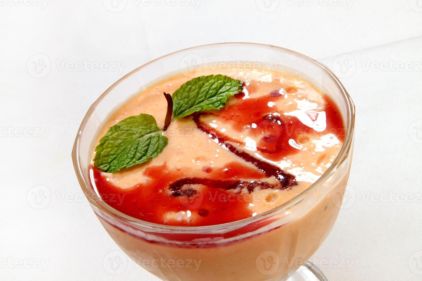 Papaya cream with cassis liqueur in a glass, Brazilian dessert photo