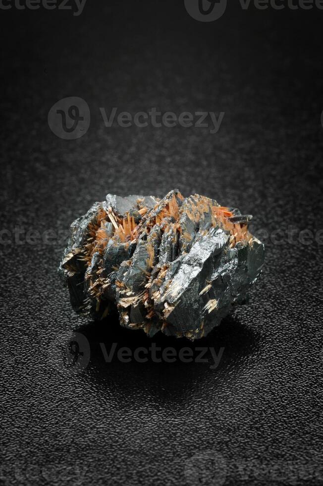 Rutile, Brazilian gemstone on dark background photo