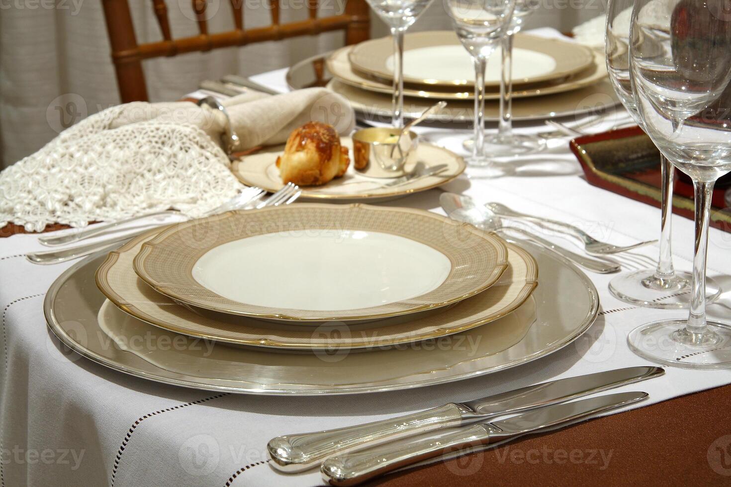 table set up for formal dining with all the details photo