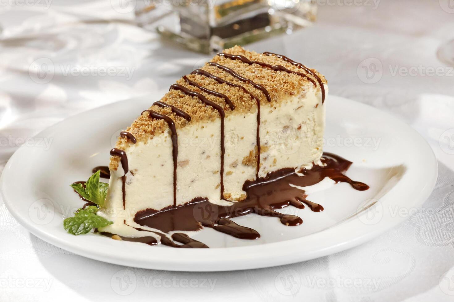 Almond cassata and chocolate sauce photo