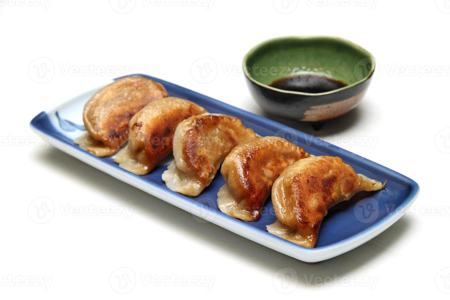 Guioza, Japanese dumpling with a filling of pork, ginger, cabbage, garlic and special sauce to accompany photo