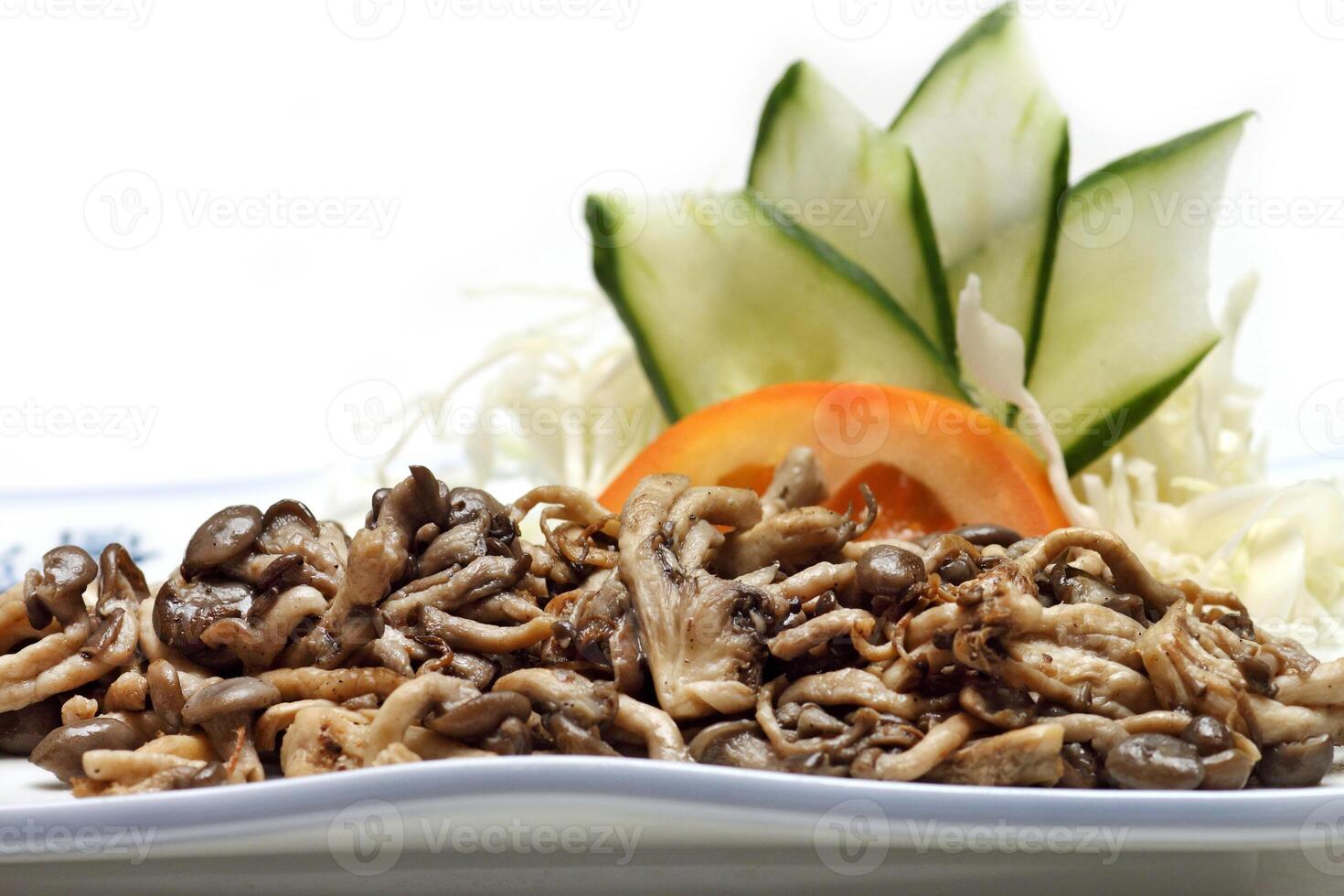 Shimeji, type of mushroom with butter, chives, garlic, soy sauce, sugar and oil photo