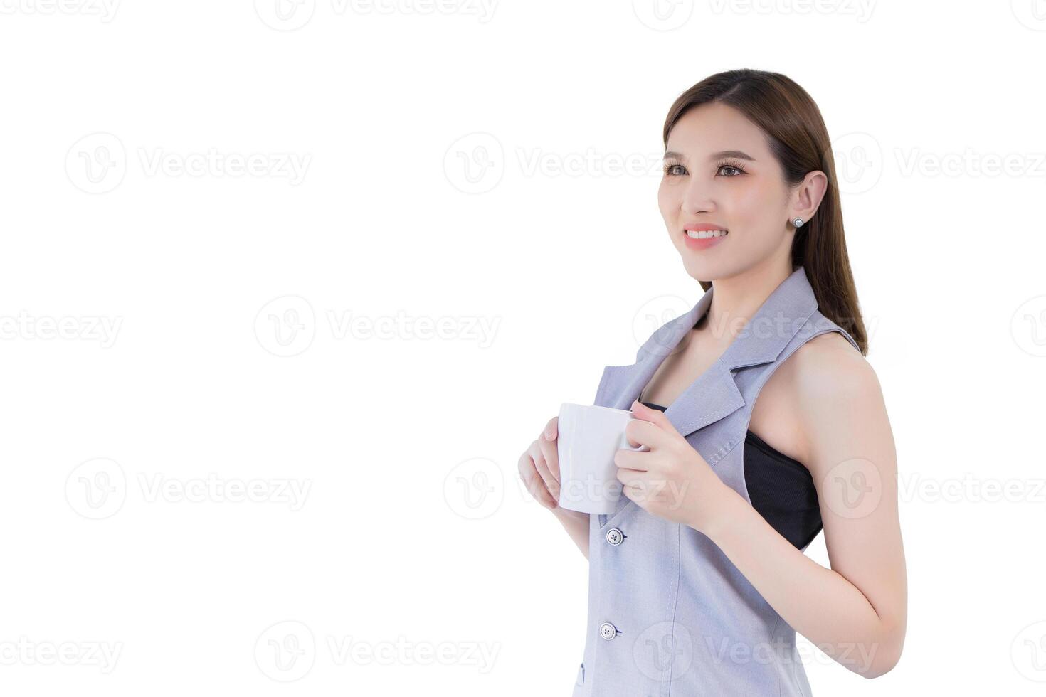 Aadult business asian confident woman is standing and hold coffee cup in her hands in working room while isolated white background. photo