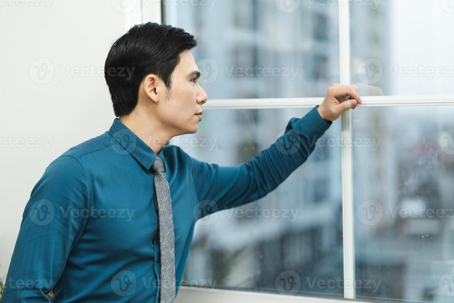 Image of Asian male businessman working in the office photo